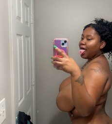 Thick ebony cow with massive udders