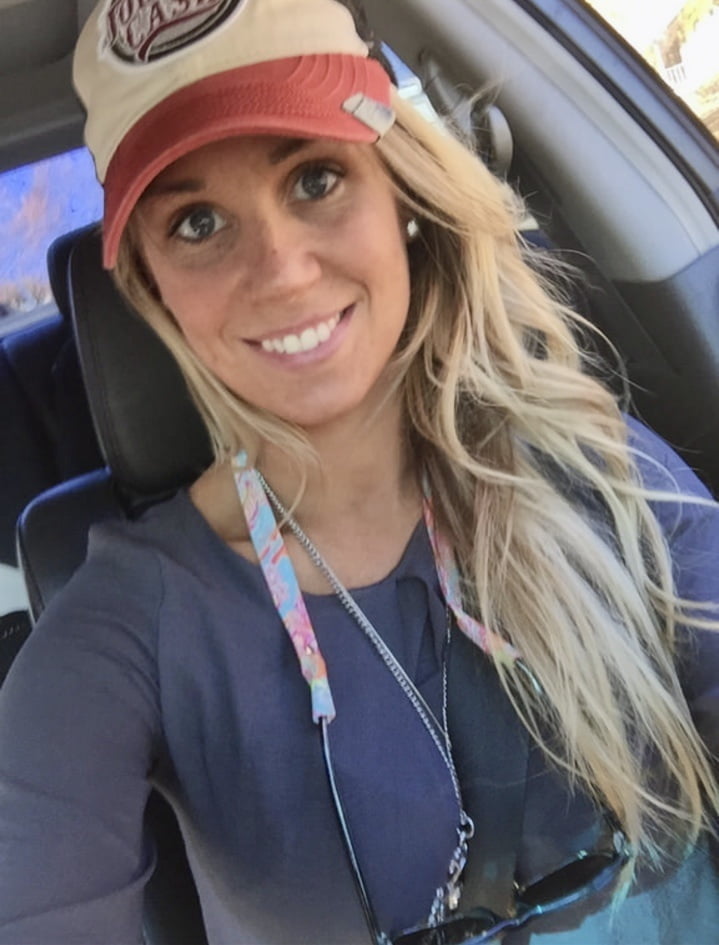 Blonde MILF with huge tits taking Selfies