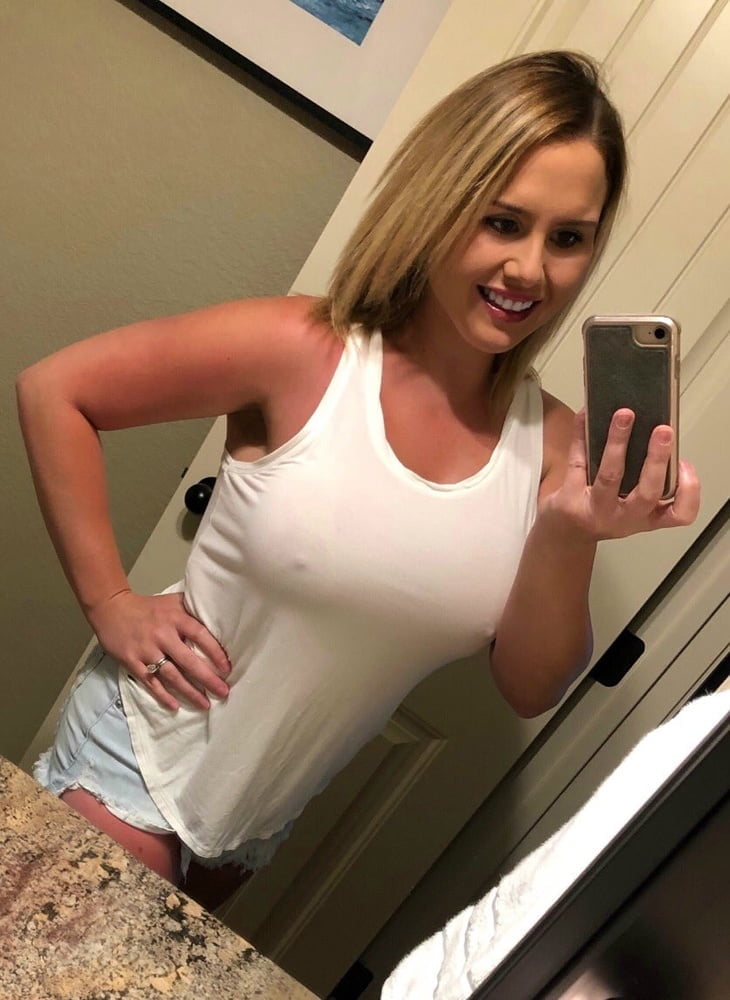 Blonde MILF with huge fake tits