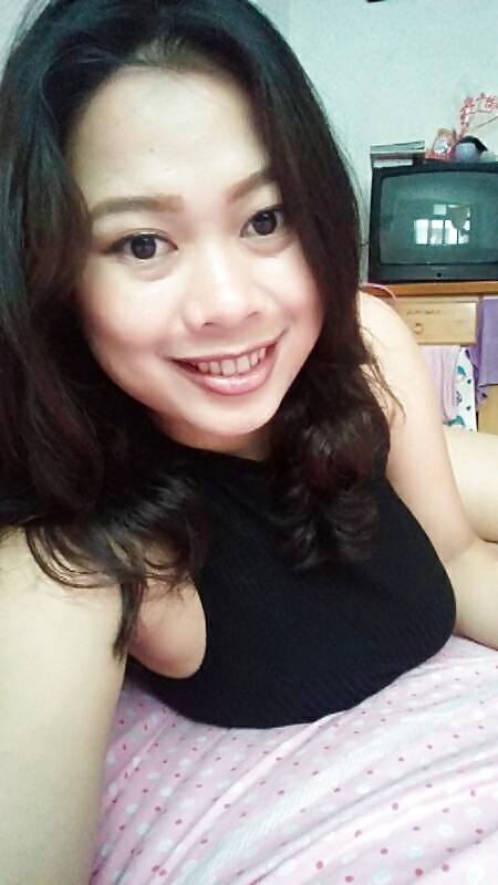 Thick Asian Spreads In Her Heels And Stockings