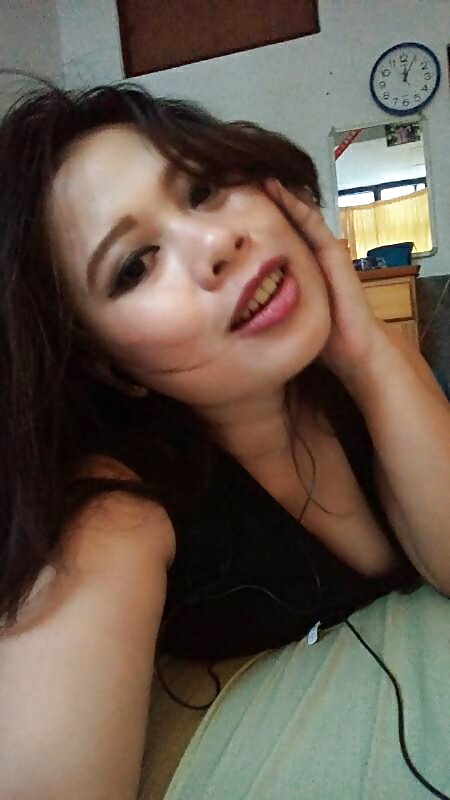 Thick Asian Spreads In Her Heels And Stockings