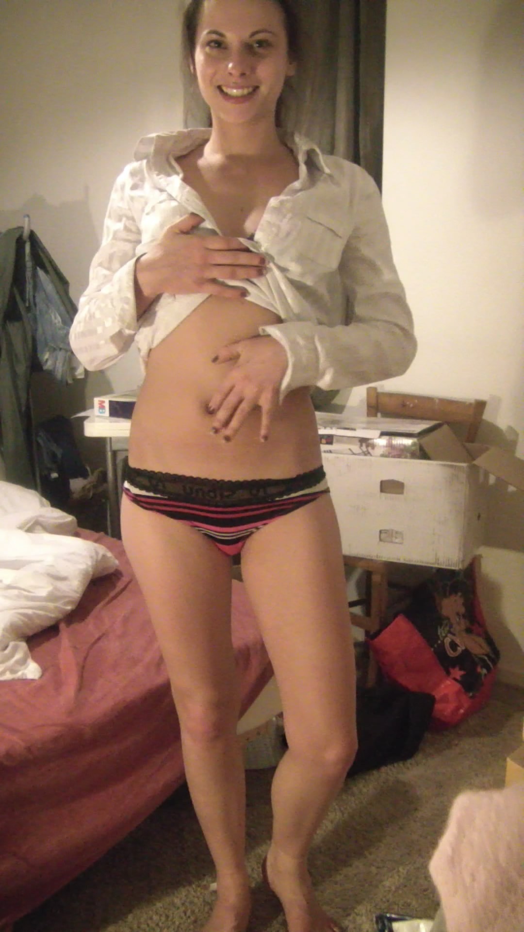 Sexy Brunette Trying On Clothing