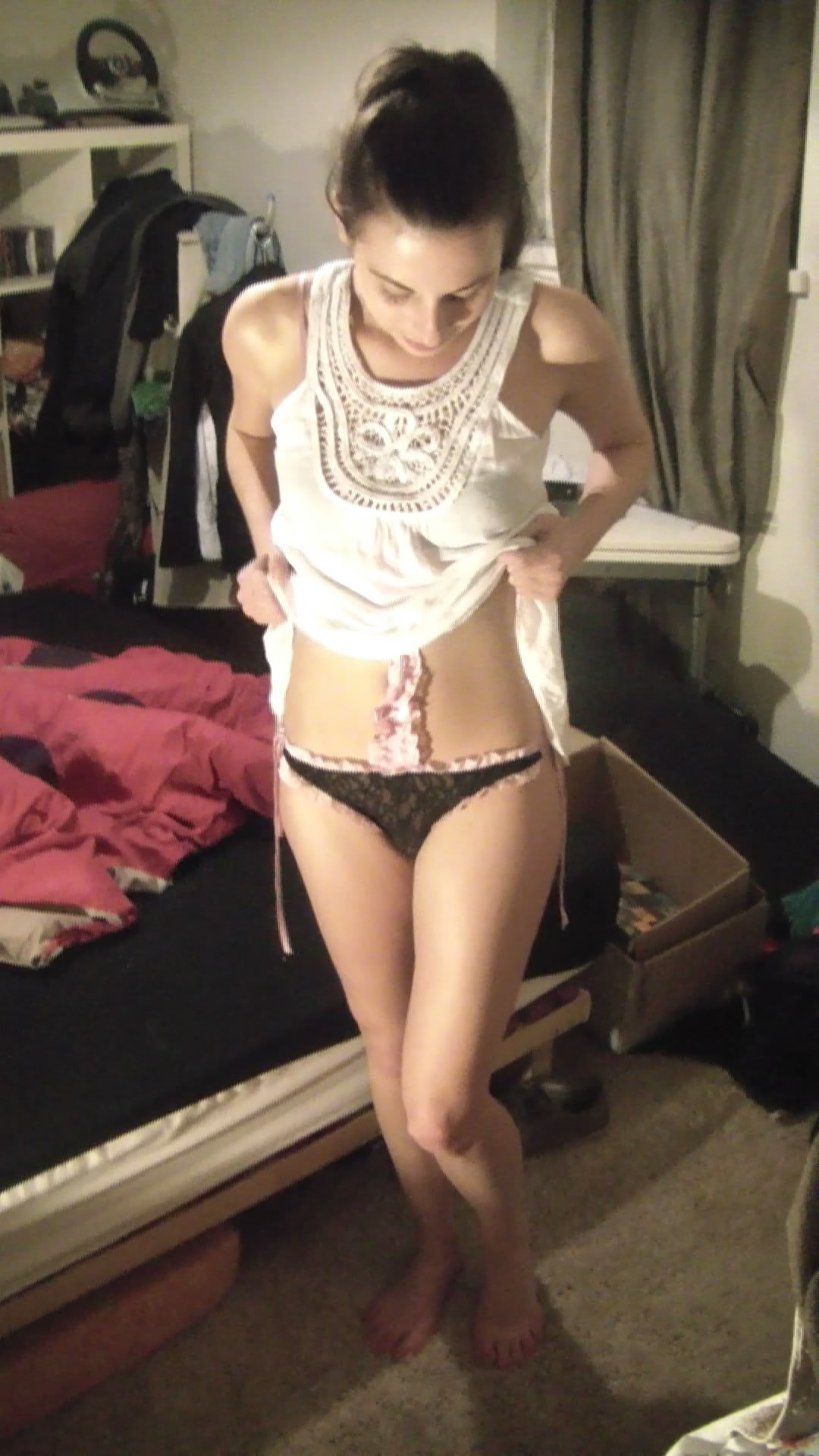 Sexy Brunette Trying On Clothing