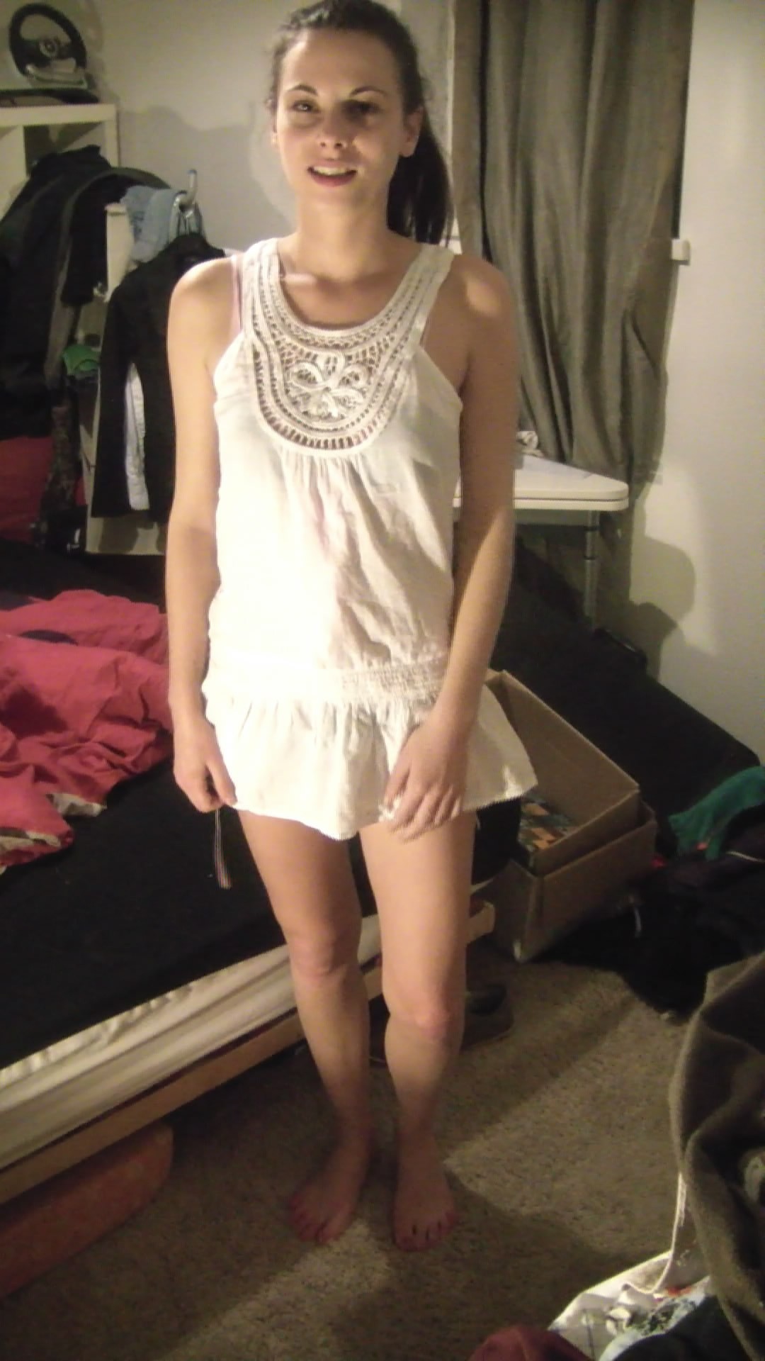 Sexy Brunette Trying On Clothing