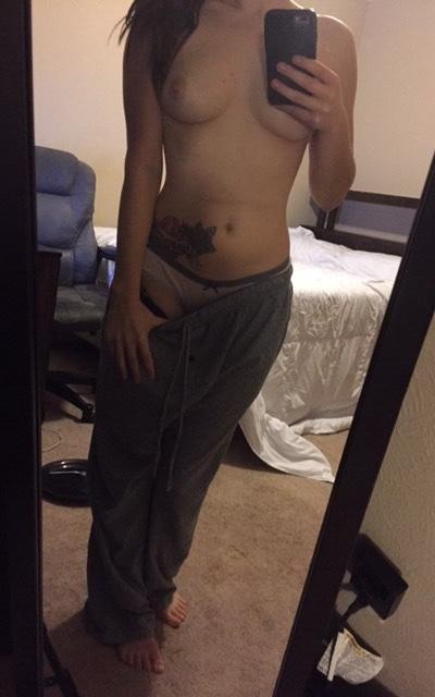 Nice Girl In Front Of Her Mirror