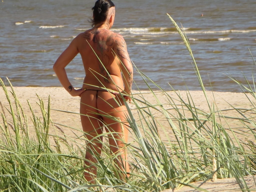 Mature Tattoo Milf on Beach