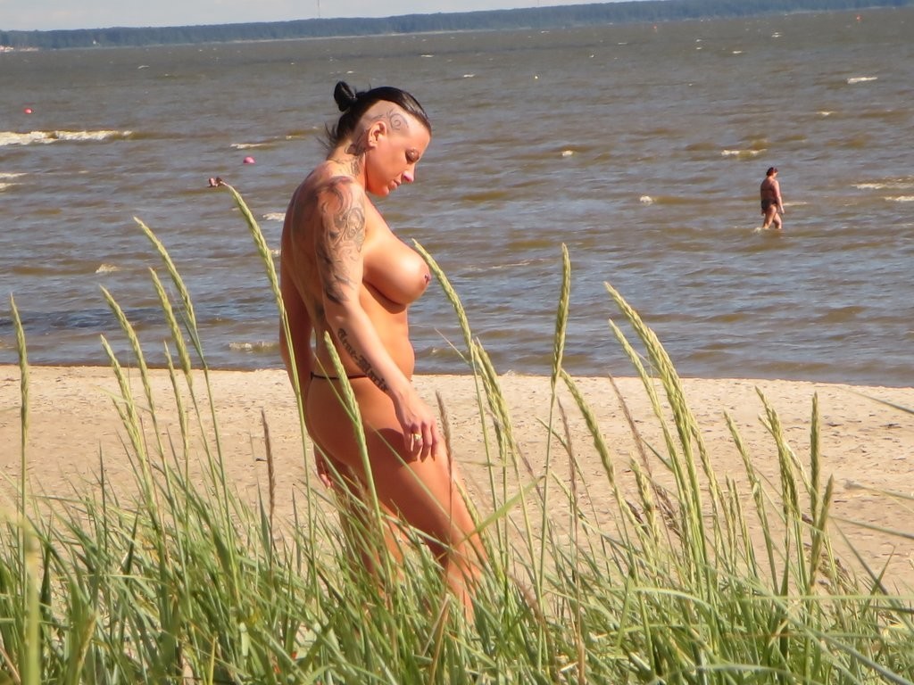 Mature Tattoo Milf on Beach