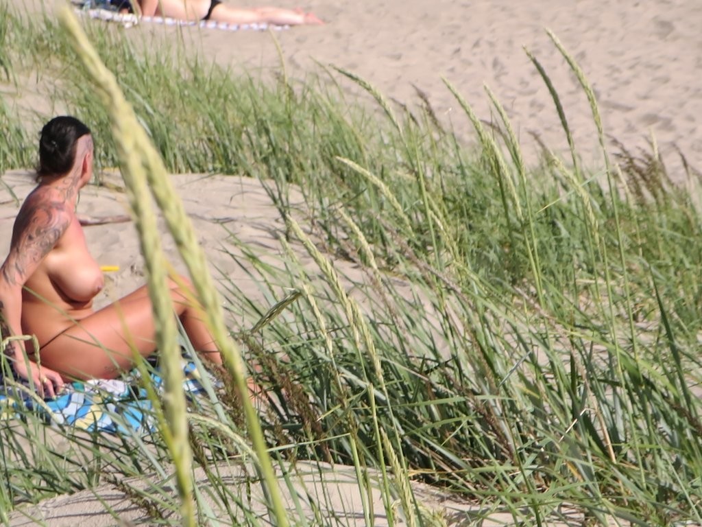 Mature Tattoo Milf on Beach