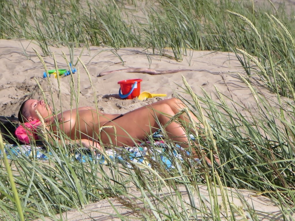 Mature Tattoo Milf on Beach