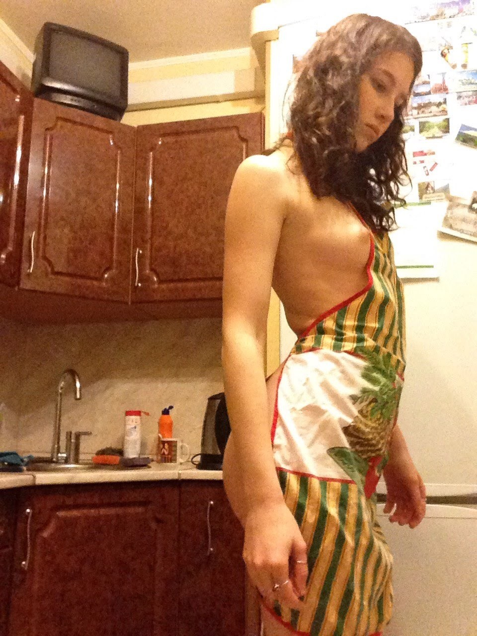 A Simple Brunette Strip Tease at Home