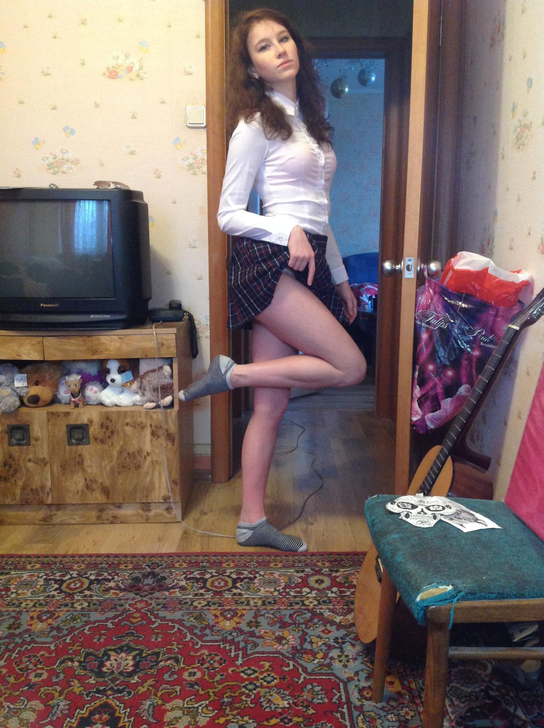 A Simple Brunette Strip Tease at Home