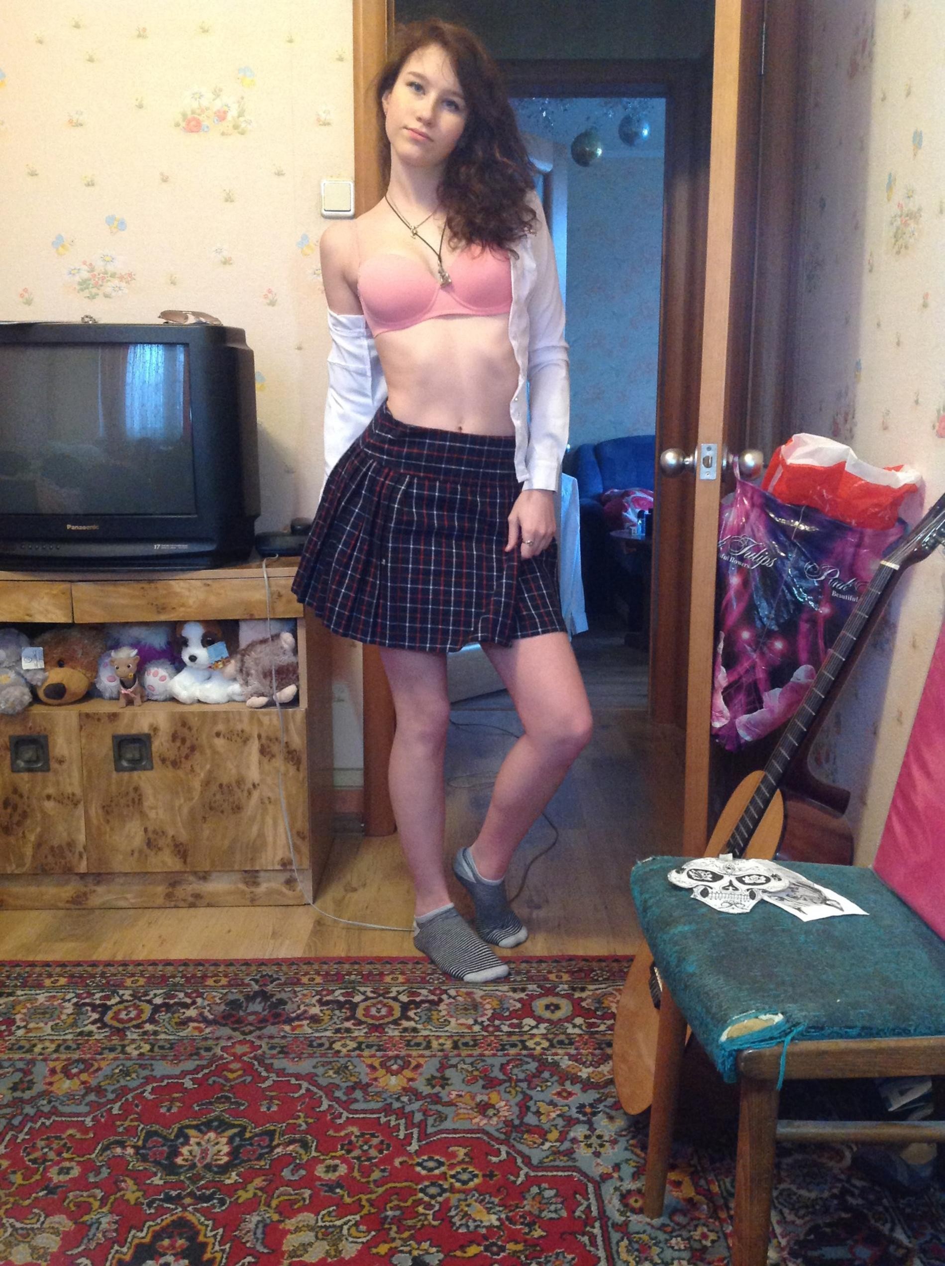 A Simple Brunette Strip Tease at Home