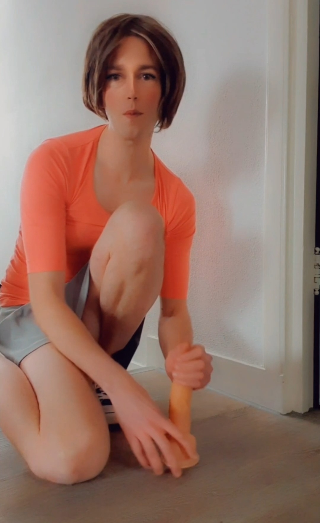 Cute Annemieke wearing chucks riding dildo