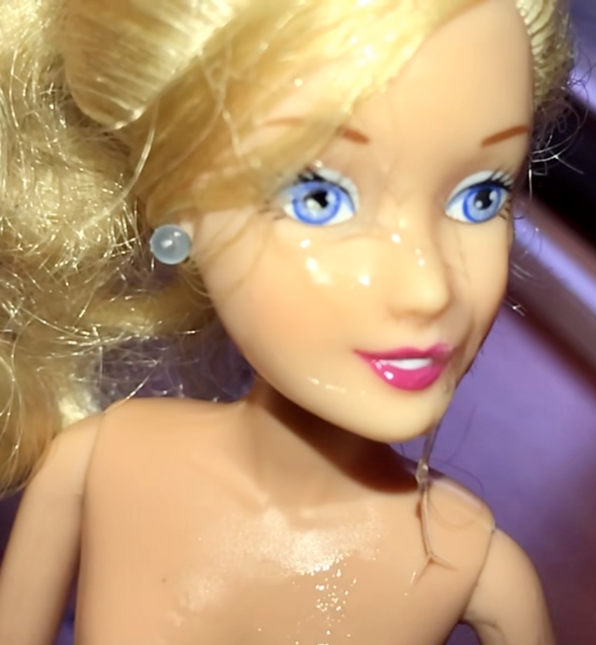 Rubbing precum on Barbie and facial