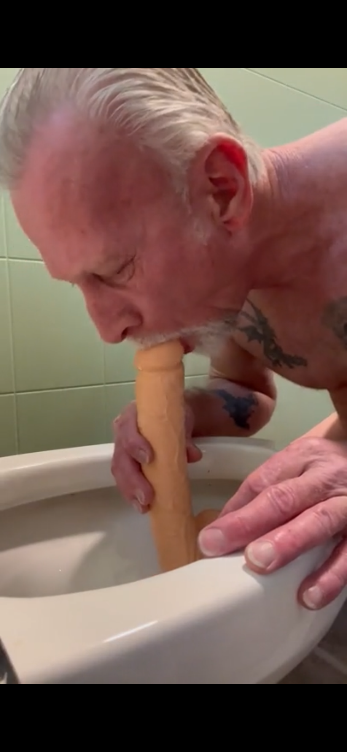 Dildo sucking public post