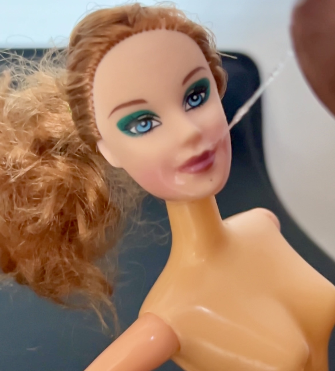 Slut faced Secondhand Barbie gets precum and cumshot facial