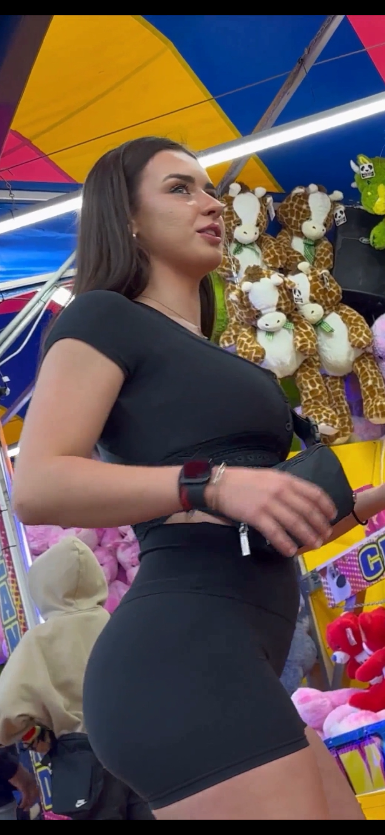 Best friends in matching booty shorts at the Carnival