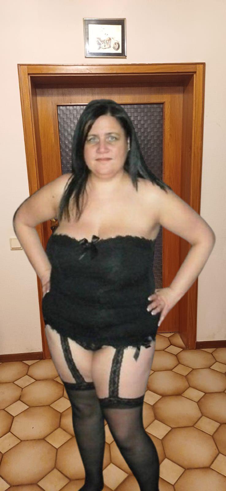 Slut Heike in lingerie and naked