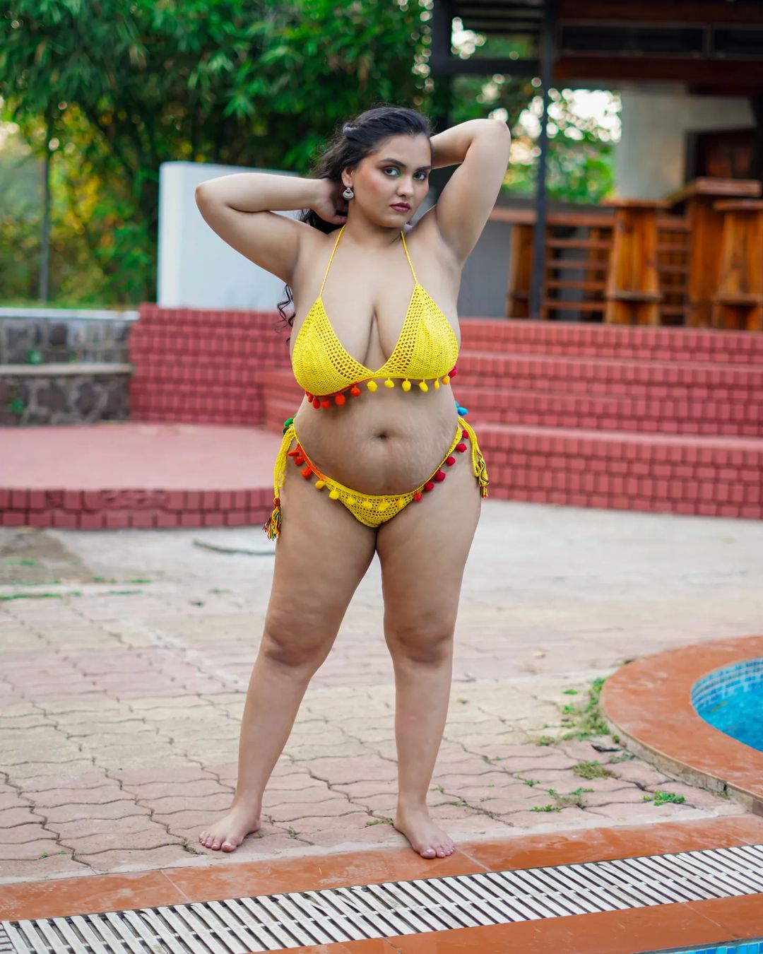 Fat Bikini model strips naked for saucy porn photos