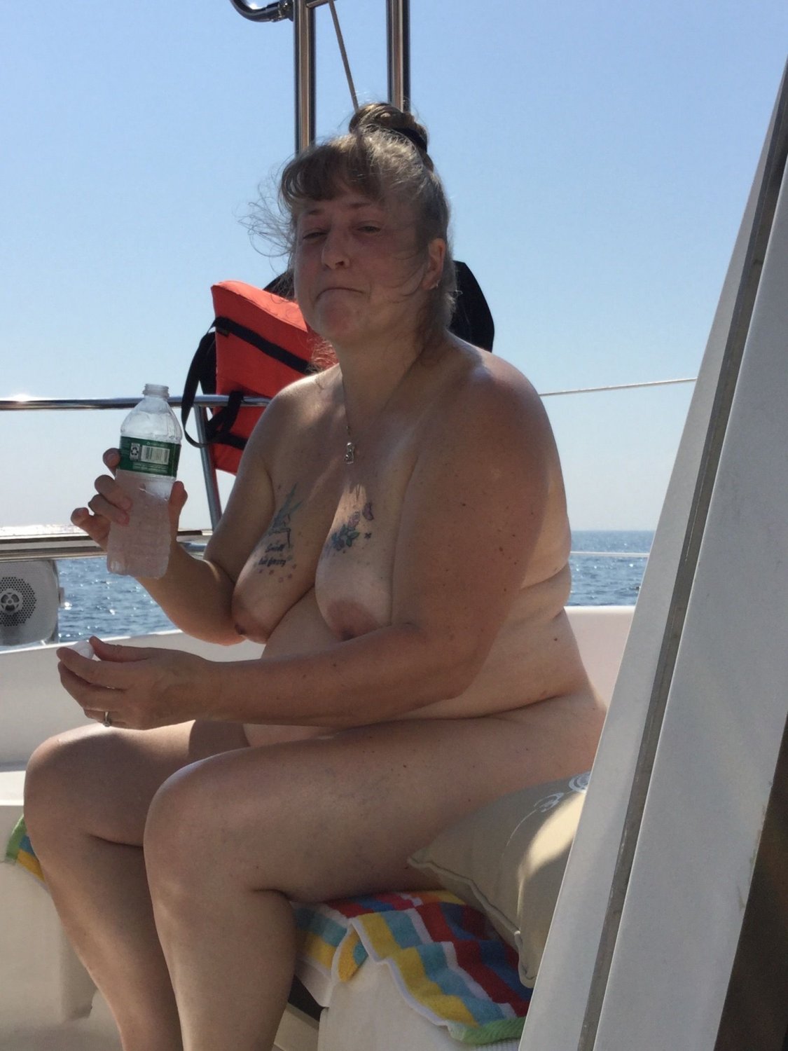 Betty big mature slut naked on a boat