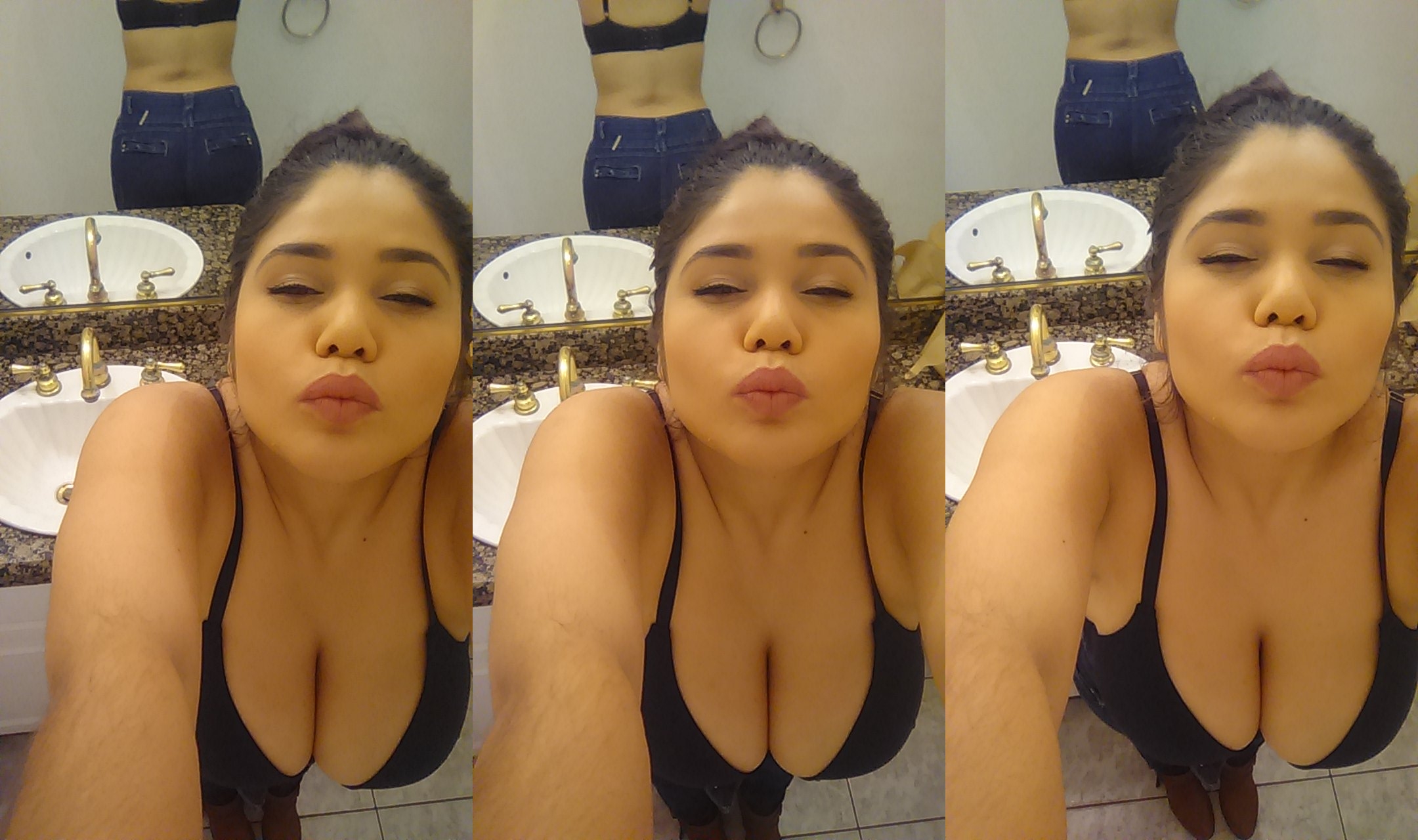 Luciendo las tetas en el bra negro