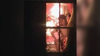 Cute teen caught naked in her room by a window peeper