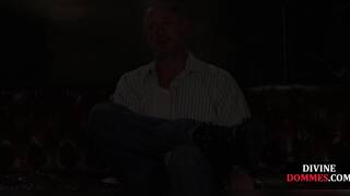 Strict leather domme whipping submissive during punishment