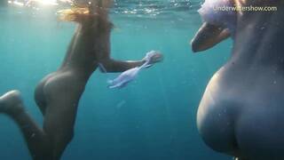 Naked girls on Tenerife having fun in the water
