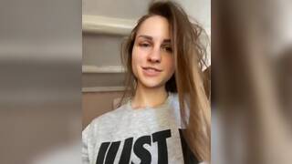 Hot teen fingers her ass on a live show