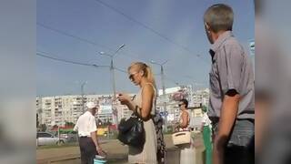 Hot sexy blonde in short dress upskirt