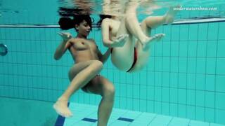 Nina Markova and Zlata Oduvanchik swimming naked in the pool