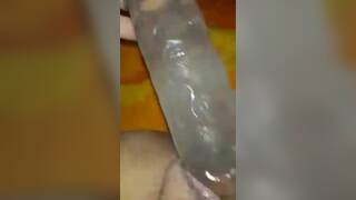 fucking her pussy with a big dildo
