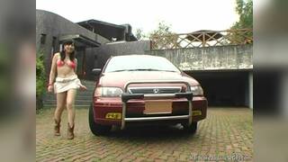 Stripteasing asian teen gets her ass and tits out