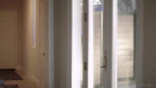 Jayden Cole and Victoria Voxxx on a bed in a lesbian scene together