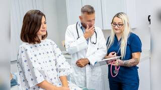 Doctor hammering sexy brunette patient