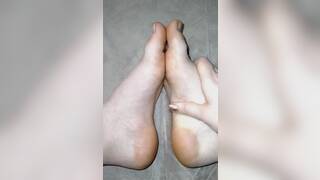 Rubbing and oiling my feet (short)