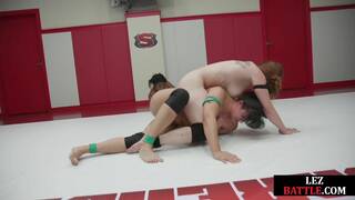 Wrestling public dykes fight on wrestling field for crowd
