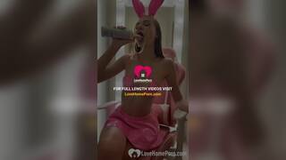 Cute bunny girl playing with her new toy