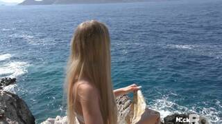 Busty blonde babe fucked on the beach