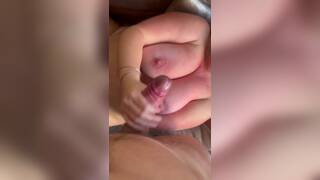 Handjob cumming all over her perfect tits