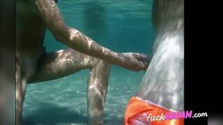 Naked Swimming MILF Gives Underwater Handjob Until He Cums