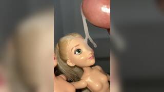 Disney’s Belle and Rapunzel Barbie doll getting facial cumshots.