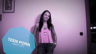 Ria Sunn and Anny on a grey coloured sofa in lesbian and vibrator scenes together