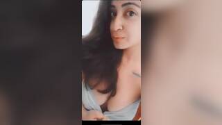 Indian babe pressing boobs