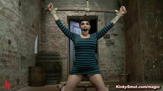 Busty submissive slave Annika bound in kneeling spread eagle position