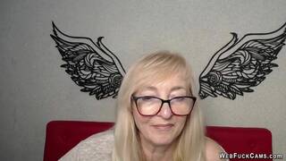 Blonde amateur MILF IngritSno with glasses on webcam