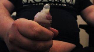 Closeup cumming in condom