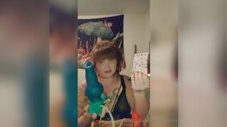 Chrystle showing off her toys