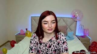 Busty redhead amateur babe NicolPot on webcam strips for fans