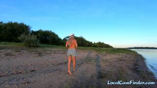 Russian Nudist on the River Shore